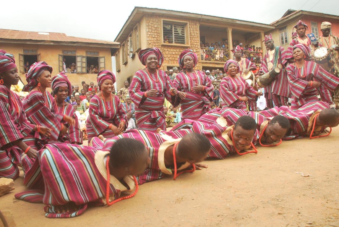 A community gathering in colourful traditional dress